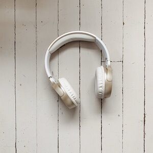 Gold and White Wireless Headphones